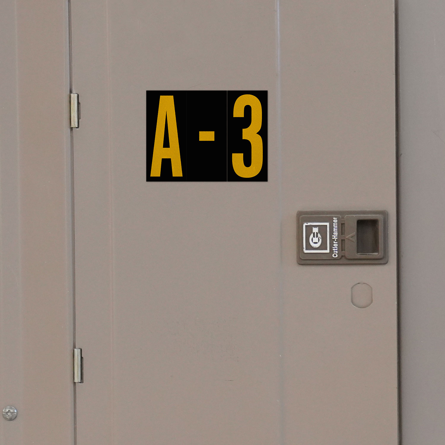1" Yellow Character on Black EG Reflective Vinyl Label
