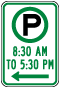 Pay Parking 8:30AM to 5:30PM to the Left Sign