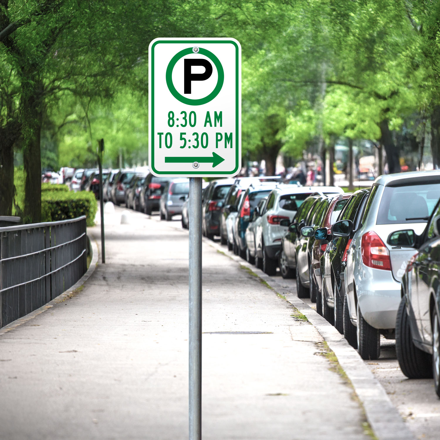 Pay Parking 8:30AM to 5:30PM to the Right Sign