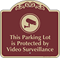 Burgundy Background – Parking Lot Protected Sign