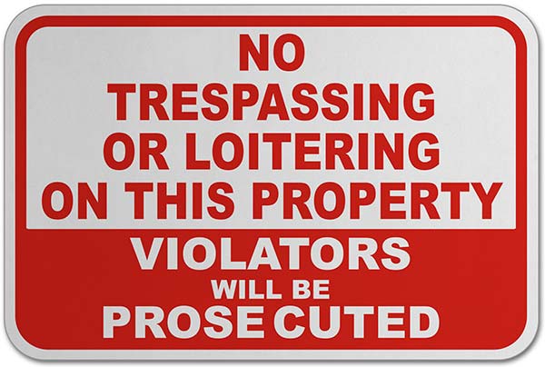 No Trespassing or Loitering Sign