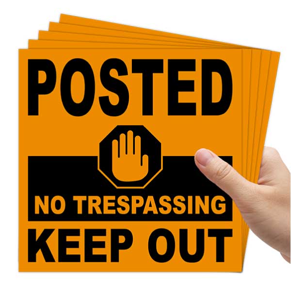Orange Posted No Trespassing Keep Out Sign