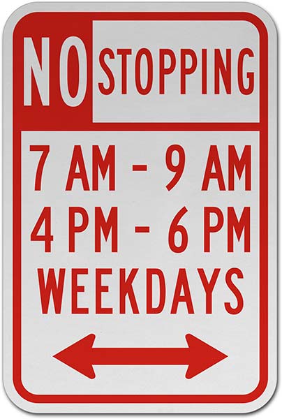 No Stopping 7 AM - 9 AM 4 PM - 6 PM Weekdays Sign