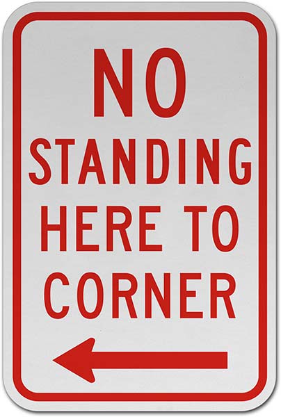 No Standing Here to Corner Sign