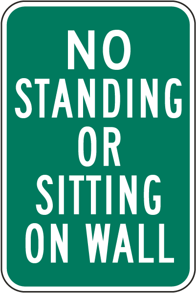 No Standing Or Sitting On Wall Sign