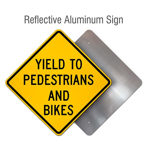 Yield To Pedestrians And Bikes Sign