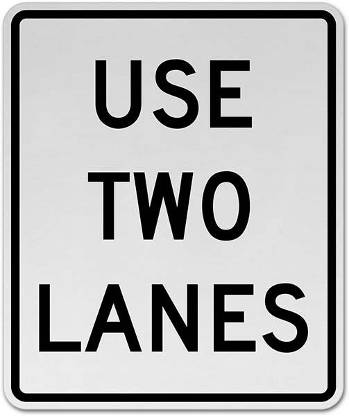 Use Two Lanes Sign