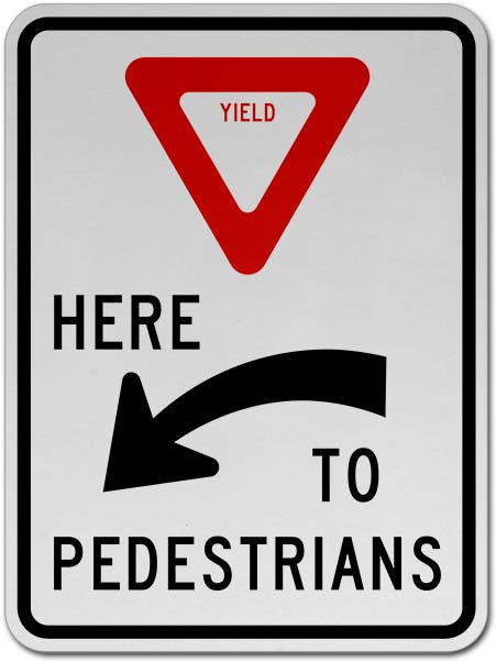 Yield Here to Pedestrians Sign