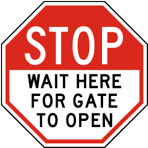 Stop Wait Here For Gate to Open Sign