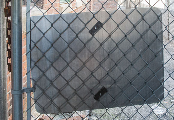 Y3521 chain link fence brackets by ParkingSign.com