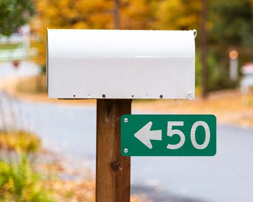 911 Address Signs with Directional arrow pointing towards the house